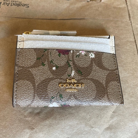 mini skinny id case in signature canvas